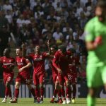 Pemain Liverpool merayakan gol Georginio Wijnaldum (tengah) ke gawang Tottenham Hotspur pada laga Liga Primer Inggris di Stadion Wembley, Sabtu (15/9).