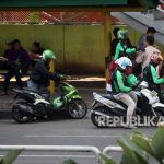 Ojek online drivers.